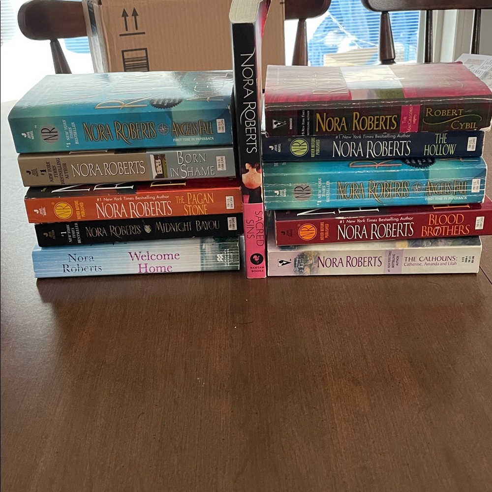 Pick any five preowned Nora Roberts Books